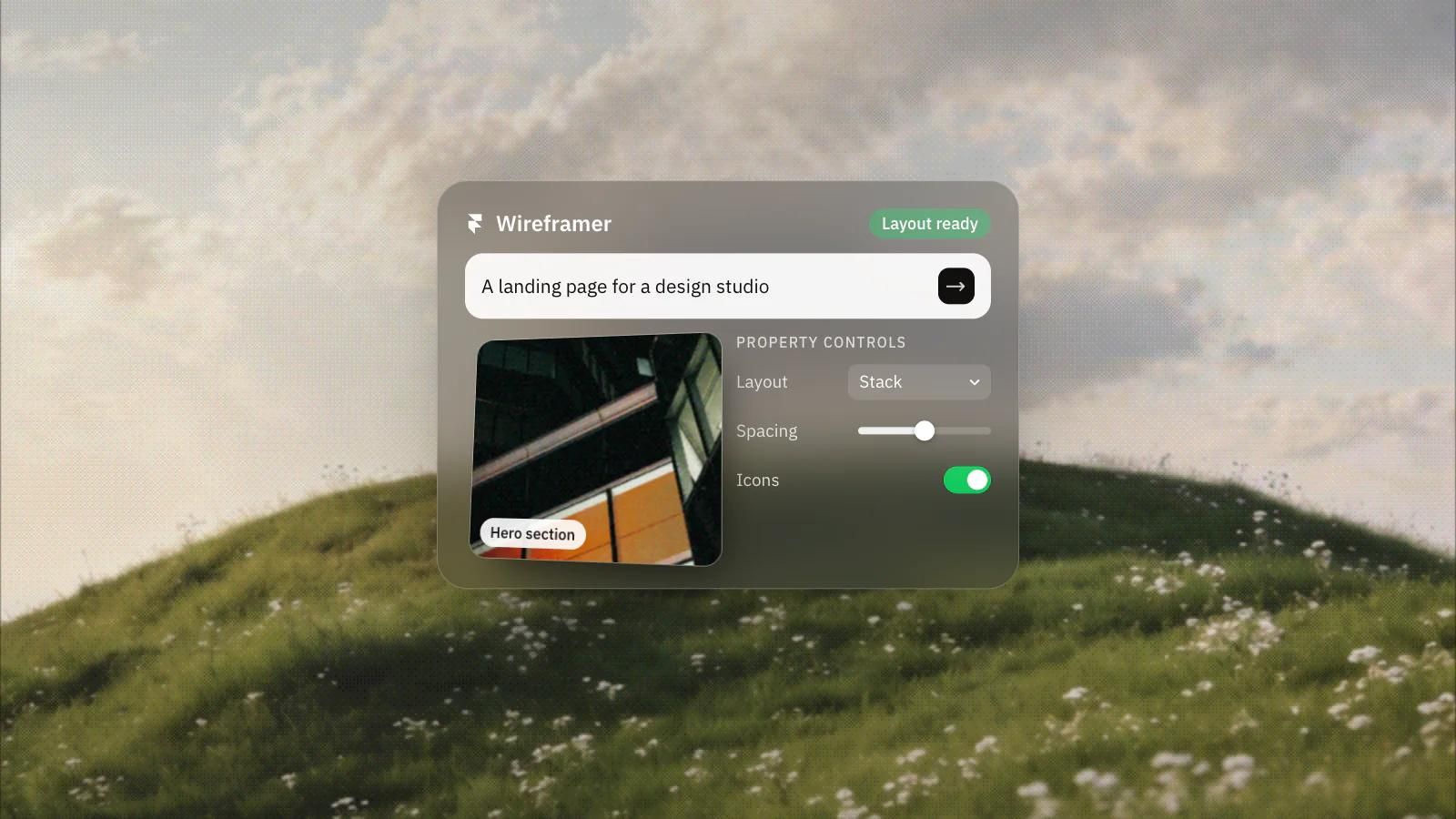 A Wireframer prompt, “A landing page for a design studio”, turned into a hero section layout with controls, on a frosted glass card over a dithered photo of clouds over a green hill.