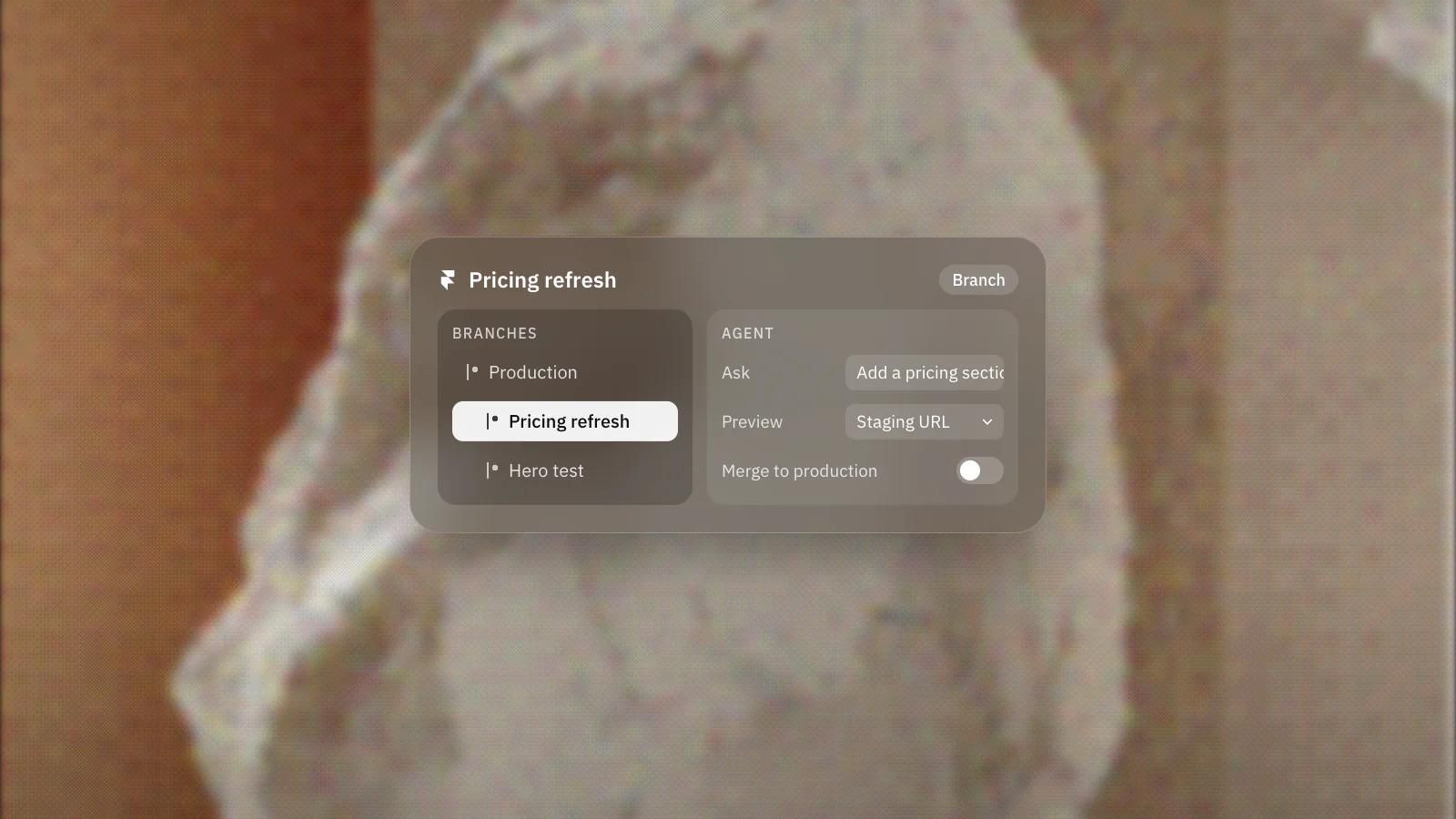 Framer branches with a pricing refresh branch selected and an Agent prompt that adds a pricing section, previewed on staging before merging, on a frosted glass card over a dithered photo of a pale stone against an orange wall.